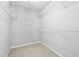 Walk-in closet with wire shelving, providing ample storage space at 3880 Lake Lanier Dr, Duluth, GA 30097