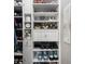 Organized shoe closet offering custom shelving and ample storage space for shoes, boots, and other accessories at 507 Southshore Ln, Dallas, GA 30157