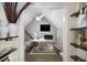 Cozy home office featuring a built-in desk, shelving, and natural light perfect for remote work or study at 507 Southshore Ln, Dallas, GA 30157
