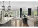 Open concept living area with hardwood floors, granite countertops, and plenty of space at 507 Southshore Ln, Dallas, GA 30157