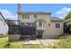 Exterior view of the home's rear, featuring a deck, screened porch, and well-maintained yard at 507 Southshore Ln, Dallas, GA 30157