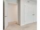 Spacious bedroom includes a double door closet and open doorway at 6851 Roswell Rd # H1, Sandy Springs, GA 30328