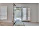 Bright living room featuring sliding doors to the outside with lots of natural light at 6851 Roswell Rd # H1, Sandy Springs, GA 30328