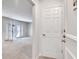 View into a light-filled living room featuring glass doors and white trim at 6851 Roswell Rd # H1, Sandy Springs, GA 30328