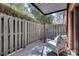 Outdoor patio with a relaxing chair and a privacy fence at 6851 Roswell Rd # H1, Sandy Springs, GA 30328