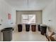 White utility room with garbage cans and a small window at 6851 Roswell Rd # H1, Sandy Springs, GA 30328