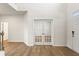 Bright foyer featuring hardwood floors, a front door, and French doors to an office at 731 Hedwig Dr, Mcdonough, GA 30252
