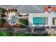 Aerial view of a private backyard oasis featuring a sparkling pool, patio, and lush landscaping at 168 Woodland Valley Rd, Lawrenceville, GA 30046