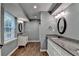 Bathroom boasts granite countertops, dual sinks, and modern fixtures at 168 Woodland Valley Rd, Lawrenceville, GA 30046
