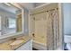 Bathroom featuring granite counters, tub and shower, and classic finishes at 168 Woodland Valley Rd, Lawrenceville, GA 30046