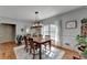 Hardwood floors and lots of natural light highlight this dining room at 168 Woodland Valley Rd, Lawrenceville, GA 30046