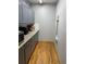 The gray kitchen features granite countertops, cabinets, and stainless steel microwave at 168 Woodland Valley Rd, Lawrenceville, GA 30046