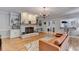 A cozy living room is displayed with hardwood floors, fireplace, and a comfortable sofa at 168 Woodland Valley Rd, Lawrenceville, GA 30046