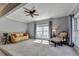 Light-filled living room with classic furnishings, large windows, and neutral decor creates a welcoming atmosphere at 168 Woodland Valley Rd, Lawrenceville, GA 30046