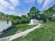 Large backyard featuring a detached garage and a well-manicured lawn at 2660 Birch Se St, Smyrna, GA 30080