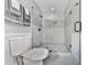 Clean bathroom featuring a modern glass shower, a tiled shower floor and modern tile at 2660 Birch Se St, Smyrna, GA 30080