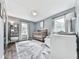 Bedroom with crib, changing table, and ample natural light, showcasing a comfortable and inviting space at 2660 Birch Se St, Smyrna, GA 30080