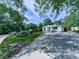 Attractive home with a well-manicured lawn, a charming facade, and a long driveway at 2660 Birch Se St, Smyrna, GA 30080