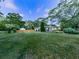 Expansive, manicured front lawn with landscaping and home view at 2660 Birch Se St, Smyrna, GA 30080