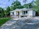 Cute home with shutters and mature landscaping, plus a long driveway at 2660 Birch Se St, Smyrna, GA 30080