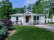 Charming home featuring a well-manicured lawn, shutters, and stone accents at 2660 Birch Se St, Smyrna, GA 30080