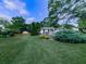 Spacious, manicured front lawn with landscaping and home view at 2660 Birch Se St, Smyrna, GA 30080