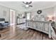 Bright main bedroom with a ceiling fan, hardwood floors, and a decorative wreath at 2660 Birch Se St, Smyrna, GA 30080