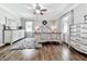 Bright main bedroom with a ceiling fan, hardwood floors, and lots of natural light at 2660 Birch Se St, Smyrna, GA 30080