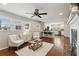 Open living area featuring hardwood floors, stylish seating, and an airy, light-filled atmosphere at 3250 North Embry Cir, Chamblee, GA 30341