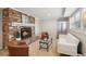 Comfortable living room with brick fireplace, white sofa, and neutral carpet at 3250 North Embry Cir, Chamblee, GA 30341