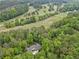 Lush foliage surrounding the property, backing up to a golf course at 357 Breeze Hill Ln, Canton, GA 30114