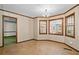 Dining room with tile flooring, natural light, and seamless access to other living spaces at 357 Breeze Hill Ln, Canton, GA 30114