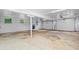 Spacious garage with two car garage door, windows, and concrete flooring at 357 Breeze Hill Ln, Canton, GA 30114