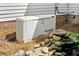 Exterior showing a back-up generator unit in a backyard setting at 357 Breeze Hill Ln, Canton, GA 30114