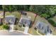 Aerial view showcases the property's layout, including a spacious backyard with a playset and fire pit at 4285 Hunters Walk Way, Cumming, GA 30028