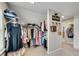 Walk-in closet with clothing racks and storage, perfect for keeping things organized and accessible at 4285 Hunters Walk Way, Cumming, GA 30028