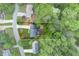 Aerial view of the property and surrounding lush greenery, highlighting the lot's dimensions at 2249 Hill Creek Way, Marietta, GA 30062