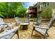 Enjoy the backyard stone patio with a firepit, perfect for outdoor entertaining at 2249 Hill Creek Way, Marietta, GA 30062