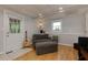 Finished basement with exterior door, guitar, and comfortable seating at 2249 Hill Creek Way, Marietta, GA 30062