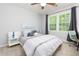 Cozy bedroom with neutral tones, bright window, and dedicated study area at 2249 Hill Creek Way, Marietta, GA 30062
