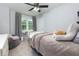 Serene bedroom featuring plush seating, natural light, and ample space for relaxing at 2249 Hill Creek Way, Marietta, GA 30062