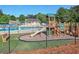 Community playground with pool in background, perfect for Gathering recreation at 2249 Hill Creek Way, Marietta, GA 30062