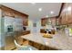 Spacious kitchen with stainless steel appliances, granite counters, island with seating at 2249 Hill Creek Way, Marietta, GA 30062