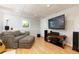 Finished basement area includes a large TV, comfortable seating, and entertainment setup at 2249 Hill Creek Way, Marietta, GA 30062