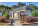 Community pool house surrounded by lush landscaping and sidewalks at 2249 Hill Creek Way, Marietta, GA 30062