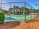 Fenced community tennis court providing a recreational space at 2249 Hill Creek Way, Marietta, GA 30062