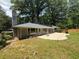 Backyard features a brick patio and a well maintained lawn at 2463 Briarmoor Ne Rd, Atlanta, GA 30345