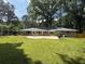 Large backyard with a patio perfect for relaxing and entertaining, and plenty of lawn space at 2463 Briarmoor Ne Rd, Atlanta, GA 30345