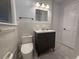 Bathroom features a modern vanity, toilet and hexagon tile flooring at 2463 Briarmoor Ne Rd, Atlanta, GA 30345