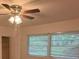 Bedroom features a ceiling fan and two large windows at 2463 Briarmoor Ne Rd, Atlanta, GA 30345